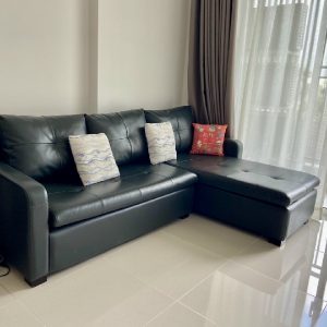 Ghế sofa chữ L cũ bọc da màu đen
